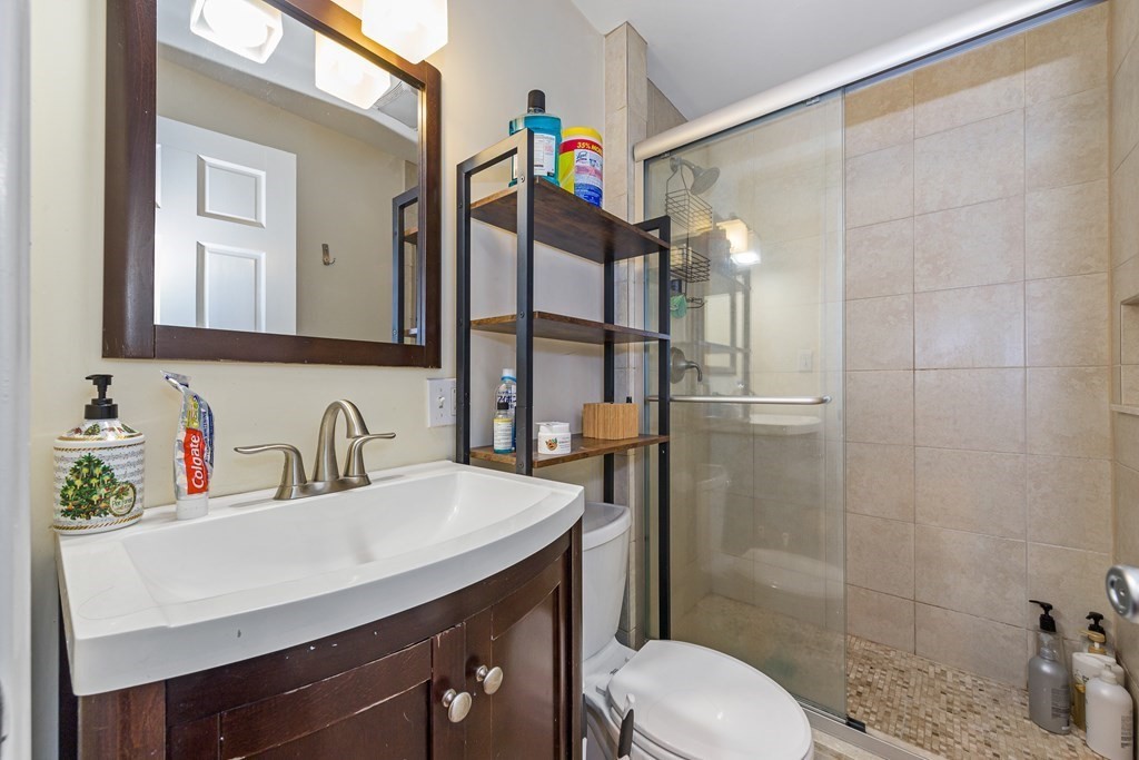 16 Sewall Street Boston, MA 02120 - Photo 13 of 42 a bathroom with a sink toilet and shower