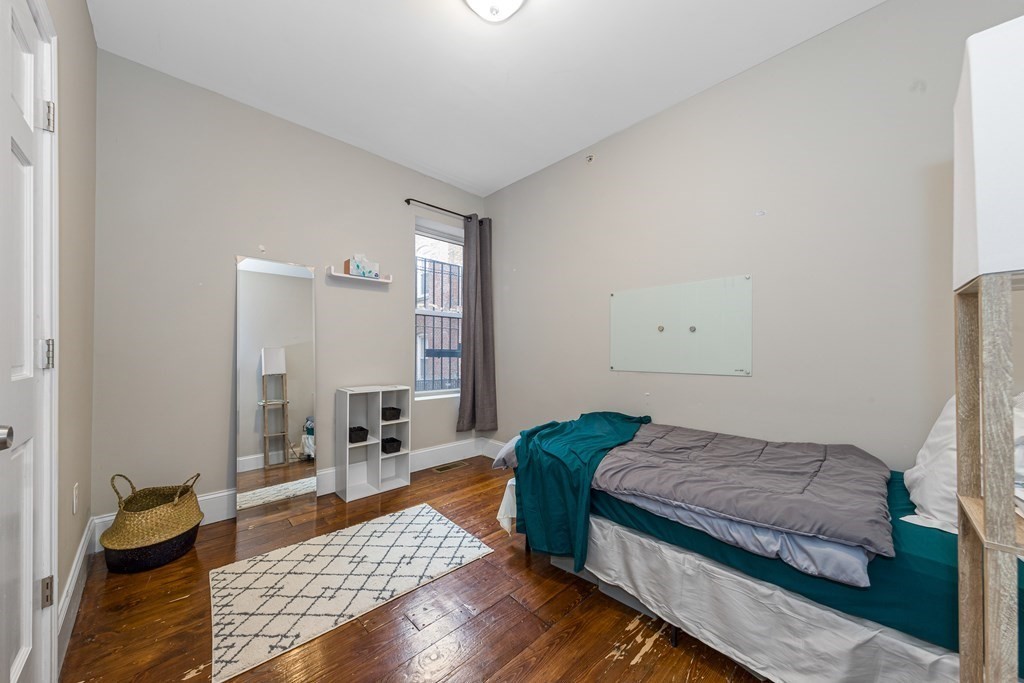 16 Sewall Street Boston, MA 02120 - Photo 14 of 42 a living room with furniture and a rug