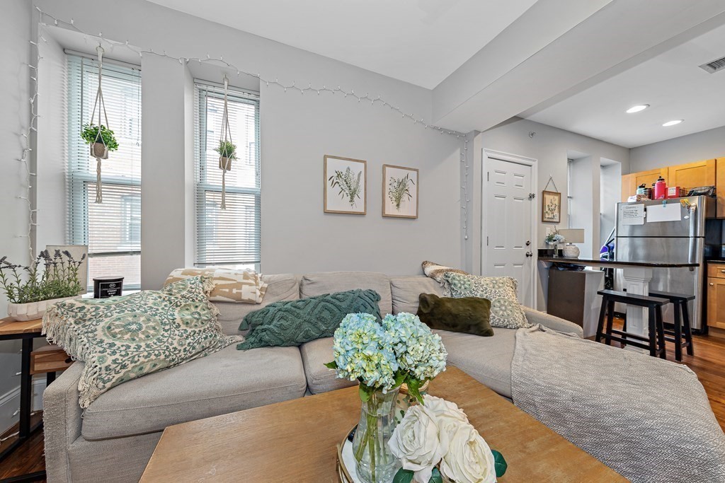 16 Sewall Street Boston, MA 02120 - Photo 2 of 42 a living room with furniture and a large window