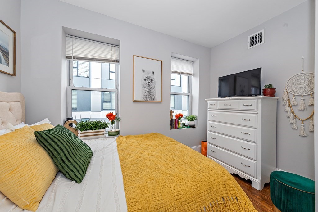 16 Sewall Street Boston, MA 02120 - Photo 39 of 42 a bedroom with a bed and a television