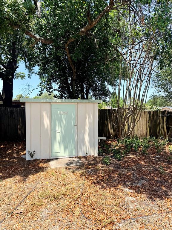 7055 Merrick Lane Spring Hill, FL 34606 - Photo 17 of 17 a view of a backyard of the house