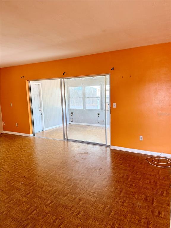 7055 Merrick Lane Spring Hill, FL 34606 - Photo 9 of 17 a view of an empty room