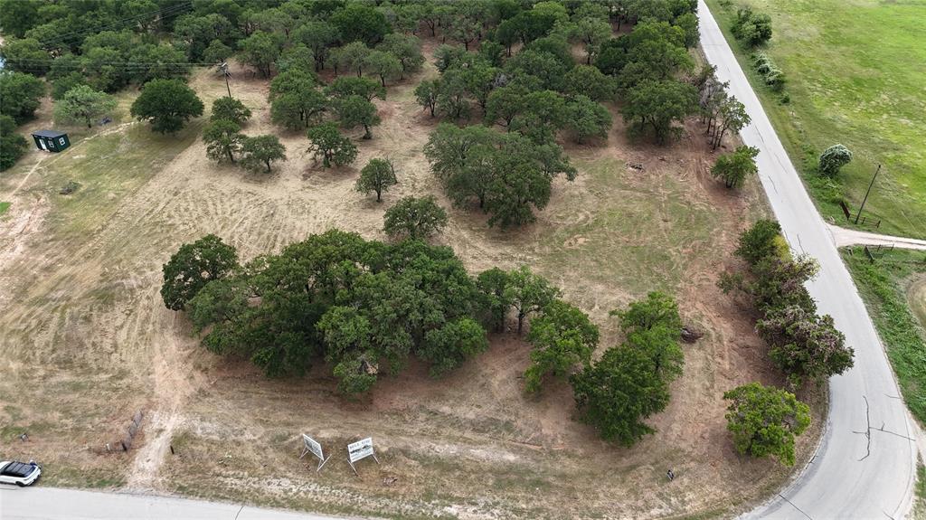1895 Sunflower Road, Unit LOT 2 Paradise, TX 76073 - Photo 15 of 25 an aerial view of a house with a yard