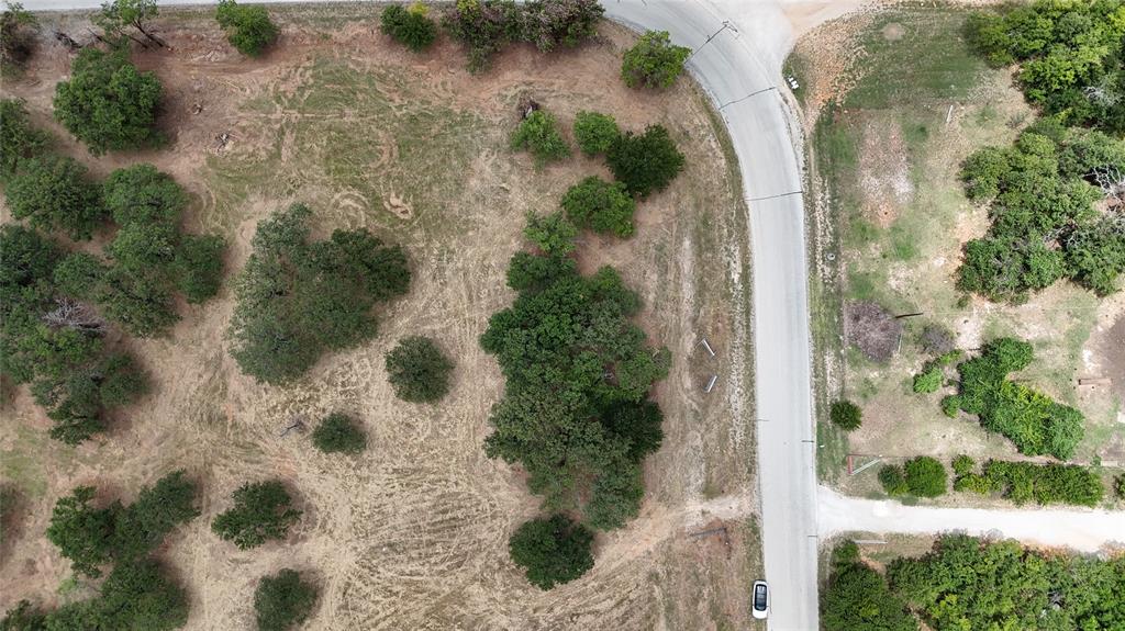 1895 Sunflower Road, Unit LOT 2 Paradise, TX 76073 - Photo 16 of 25 an aerial view of a house with a yard