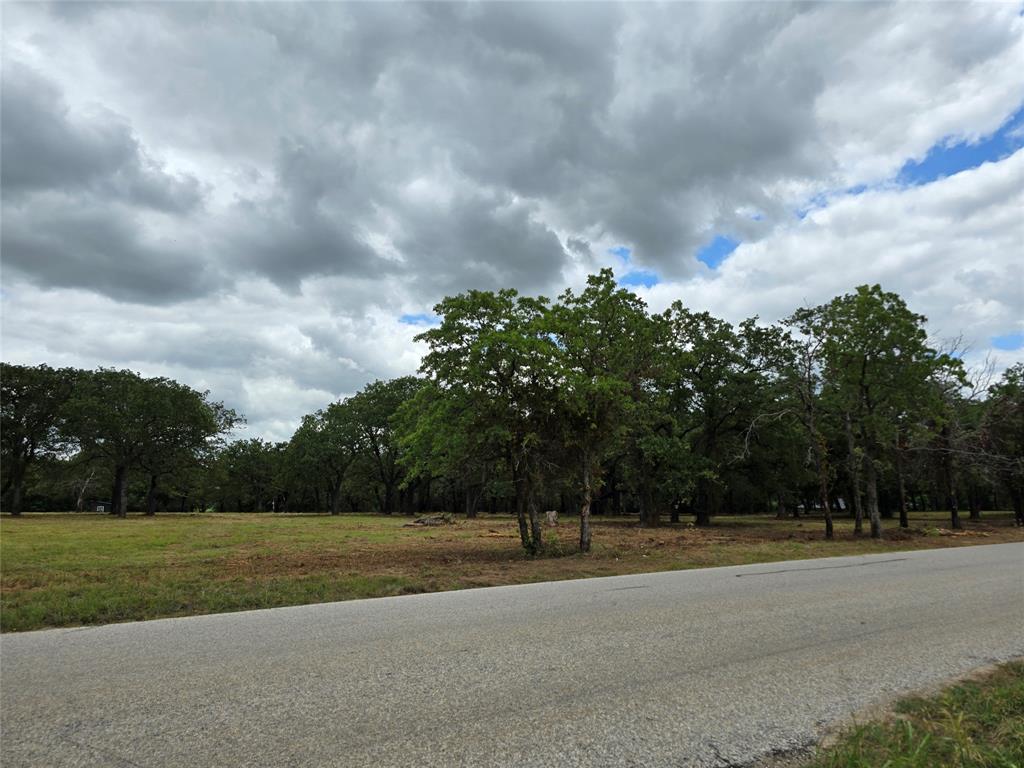 1895 Sunflower Road, Unit LOT 2 Paradise, TX 76073 - Photo 2 of 25 a view of a playground with basketball court