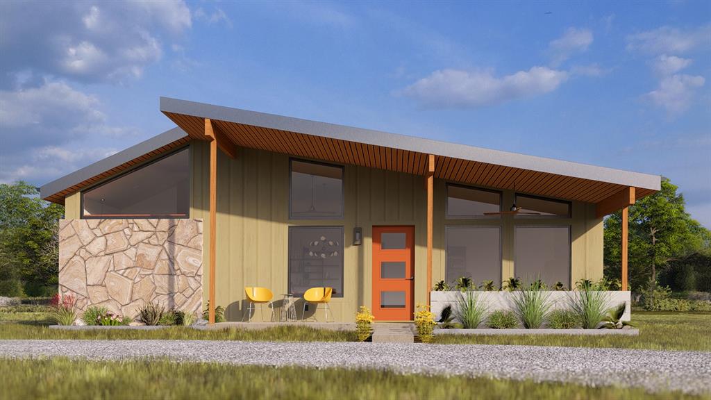 1895 Sunflower Road, Unit LOT 2 Paradise, TX 76073 - Photo 5 of 25 a front view of a house with garden