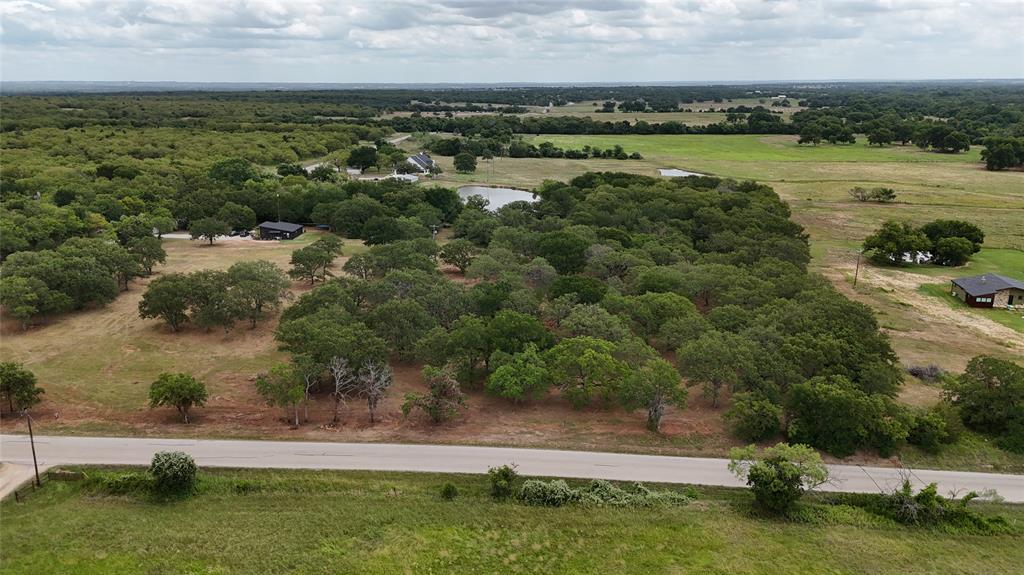 1895 Sunflower Road, Unit LOT 2 Paradise, TX 76073 - Photo 10 of 25 an aerial view of a yard with houses