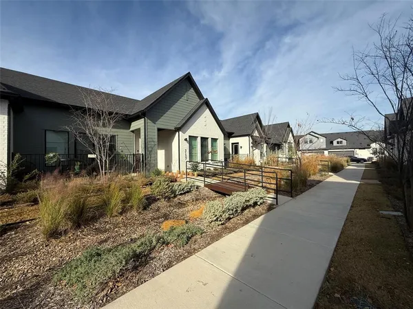 a view of a house with a street
