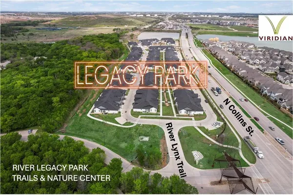 a view of a swimming pool with outdoor seating and plants