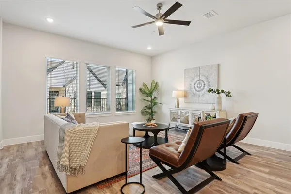 a living room with furniture and a window