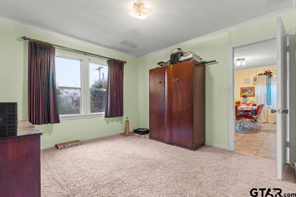 2131 Tryon Road Longview, TX 75601 - Photo 13 of 39 an empty room with windows and closet