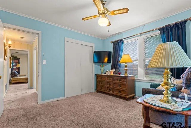 a living room with furniture and a table