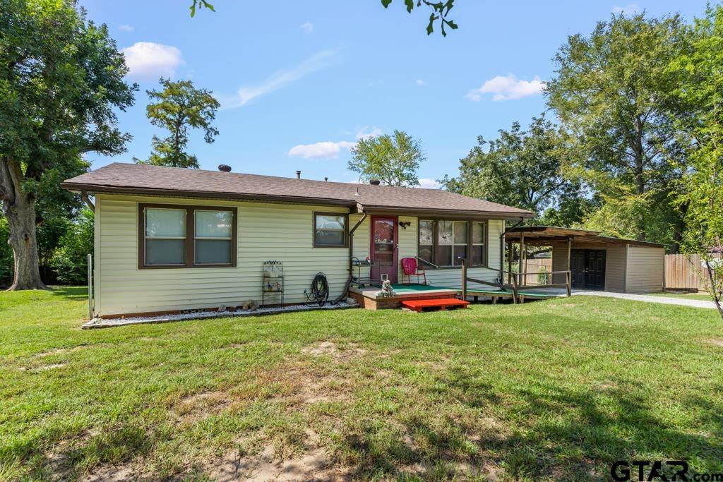 2131 Tryon Road Longview, TX 75601 - Photo 2 of 39 front view of a house with a yard