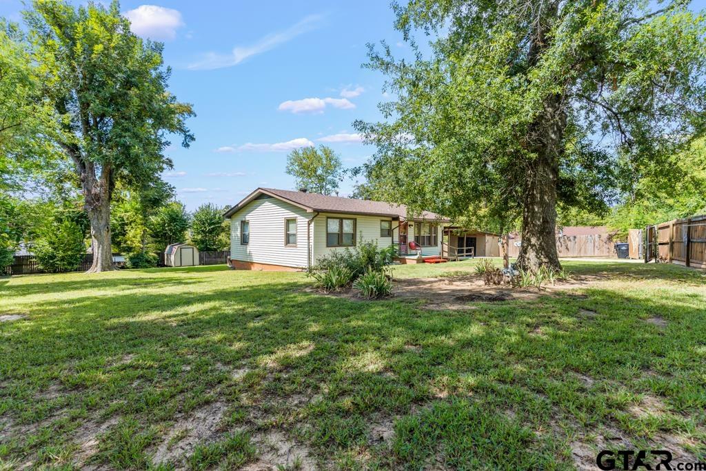 2131 Tryon Road Longview, TX 75601 - Photo 27 of 39 a front view of house with yard and green space