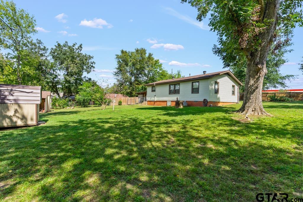 2131 Tryon Road Longview, TX 75601 - Photo 28 of 39 a house view with a garden space