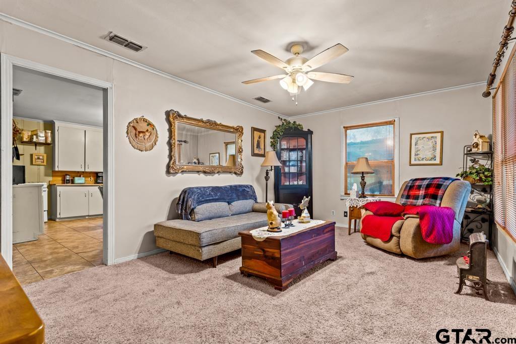 2131 Tryon Road Longview, TX 75601 - Photo 3 of 39 a living room with furniture and kitchen view