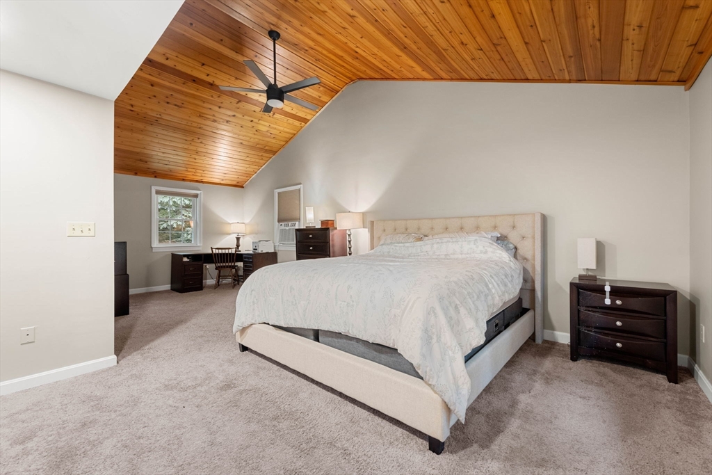 25 Holly Drive Gardner, MA 01440 - Photo 16 of 32 a spacious bedroom with a bed and a night stand