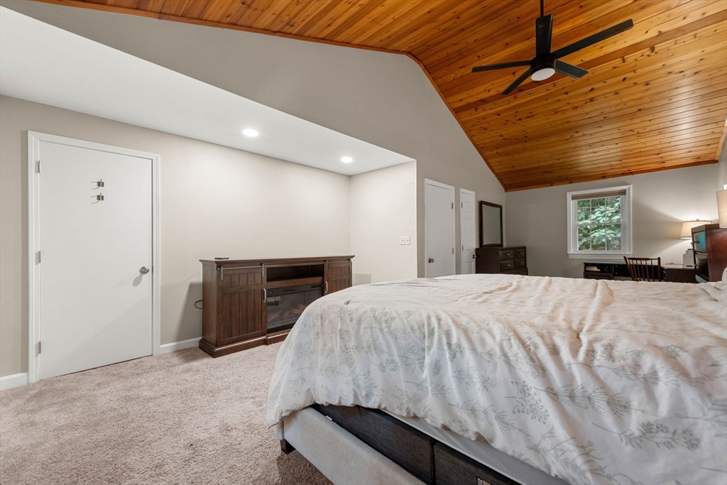 25 Holly Drive Gardner, MA 01440 - Photo 17 of 32 a bed room with a bed and a television