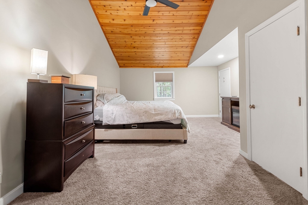 25 Holly Drive Gardner, MA 01440 - Photo 18 of 32 a bedroom with a bed and a walk in closet