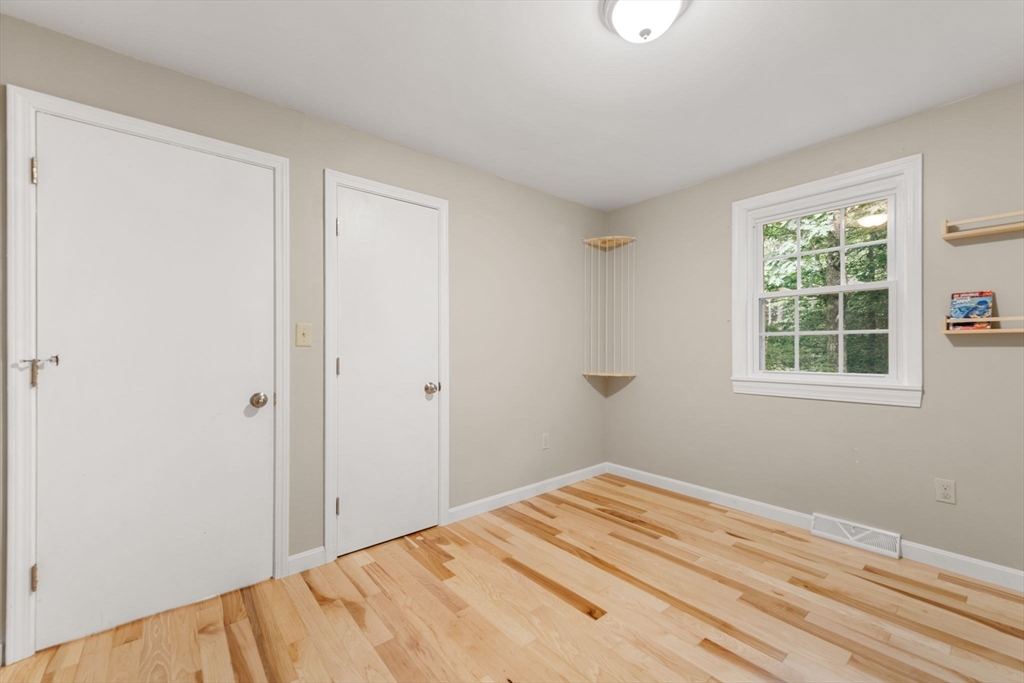 25 Holly Drive Gardner, MA 01440 - Photo 20 of 32 a bed room with a bed and a window