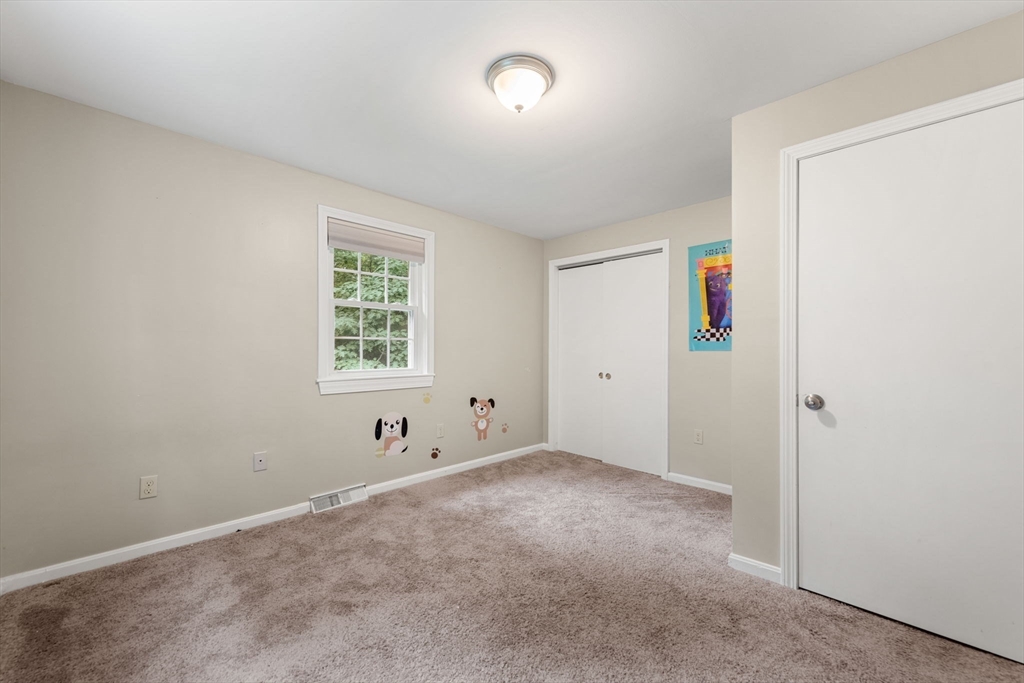 25 Holly Drive Gardner, MA 01440 - Photo 22 of 32 an empty room with a window