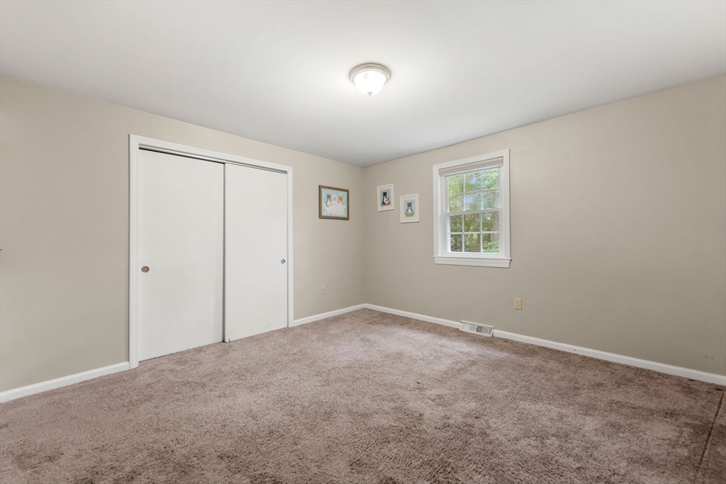 25 Holly Drive Gardner, MA 01440 - Photo 24 of 32 a view of an empty room with a window