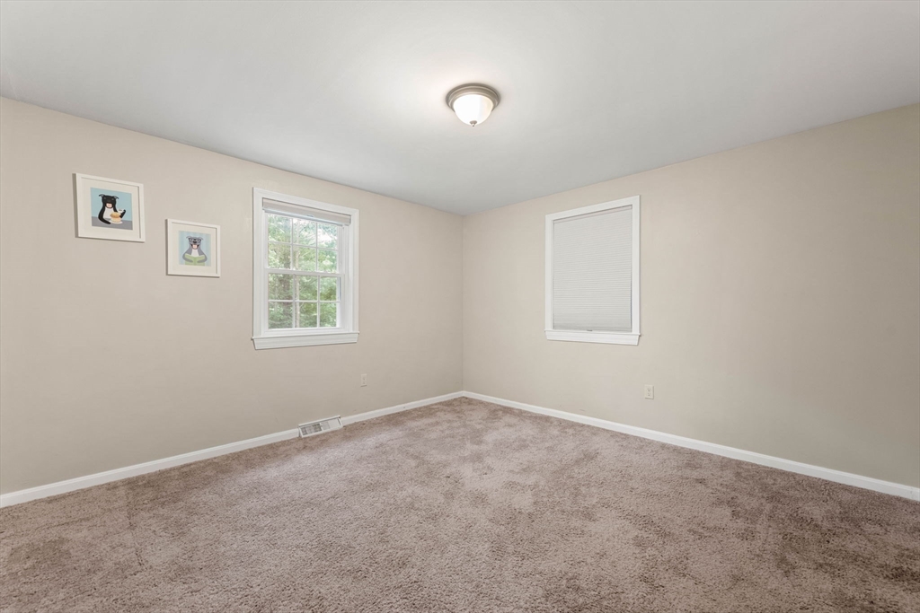 25 Holly Drive Gardner, MA 01440 - Photo 25 of 32 an empty room with windows
