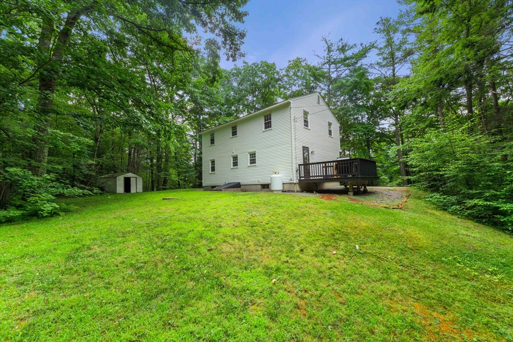 25 Holly Drive Gardner, MA 01440 - Photo 3 of 32 a view of a house with backyard and garden