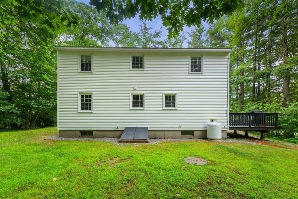 25 Holly Drive Gardner, MA 01440 - Photo 4 of 32 a front view of a house with a yard