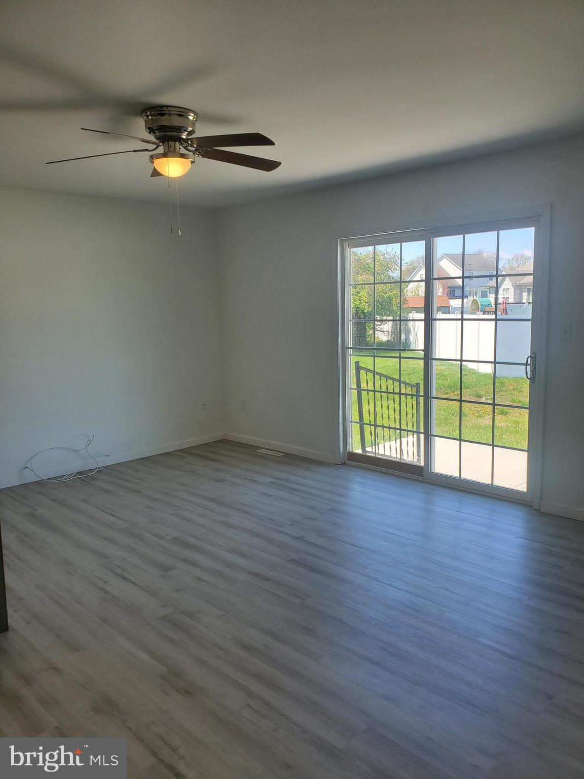 112 Holmes Street Dover, DE 19901 - Photo 21 of 24 a view of a livingroom with wooden floor