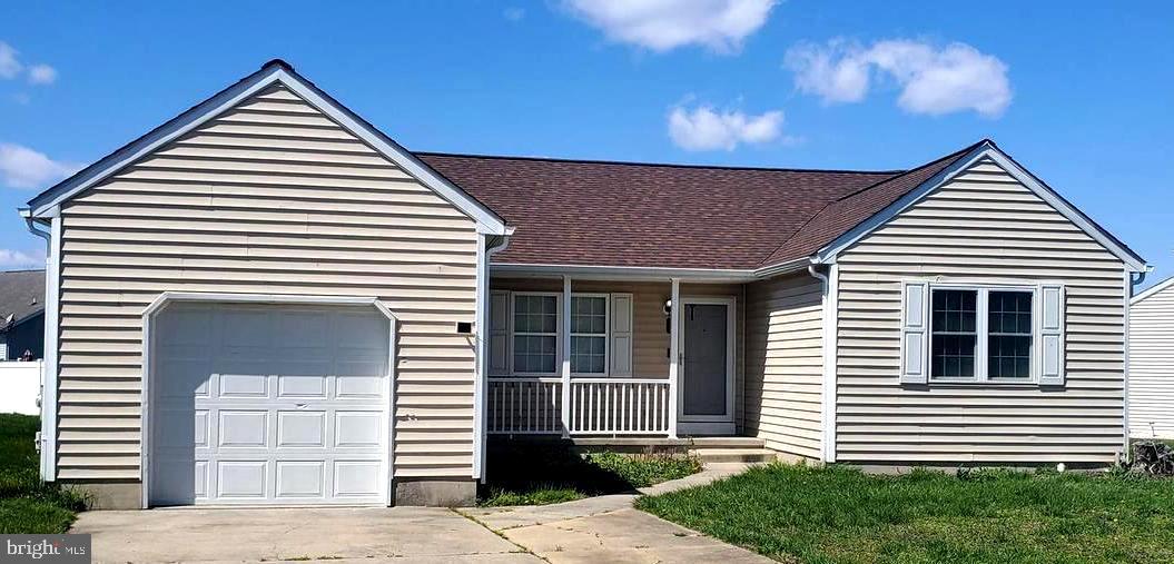 112 Holmes Street Dover, DE 19901 - Photo 24 of 24 a front view of a house with a yard