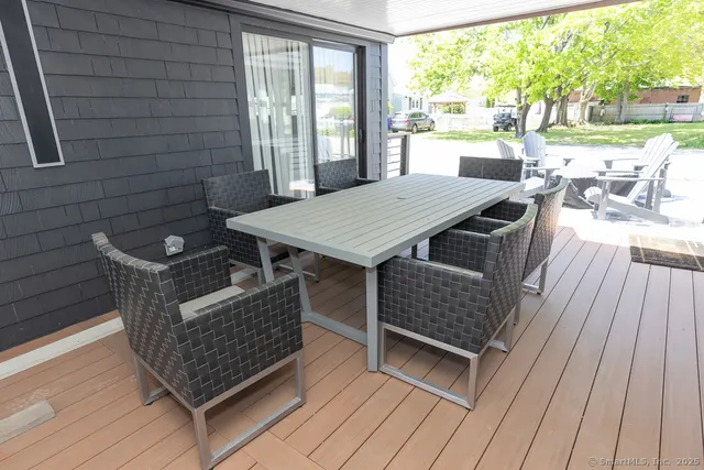 a view of living room with furniture and rug