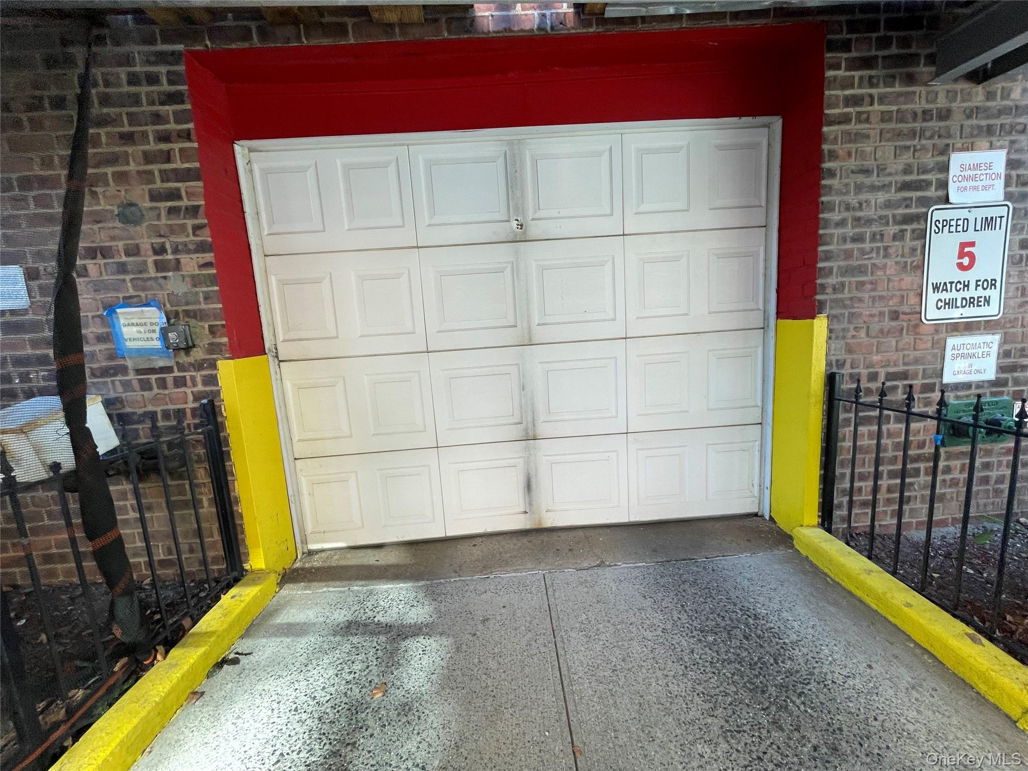 63-60 102nd Street, Unit D7 Queens, NY 11374 - Photo 26 of 41 View of garage
