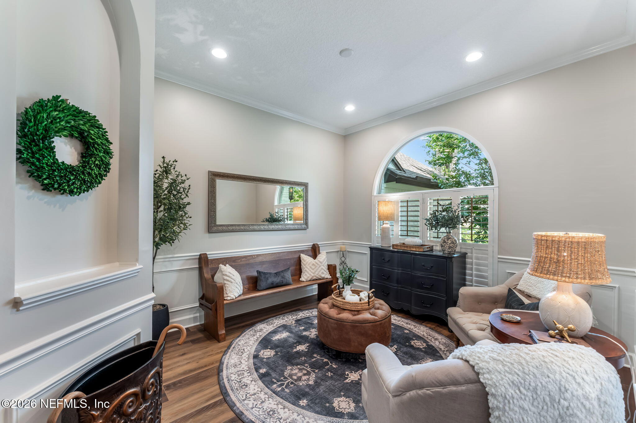 1204 Creek Bend Road St. Johns, FL 32259 - Photo 13 of 107 a living room with furniture and a large window