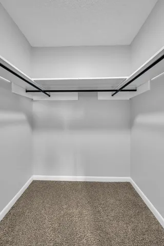 a view of a room with racks on the wall