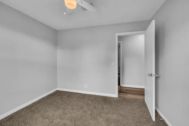 a view of an empty room and window