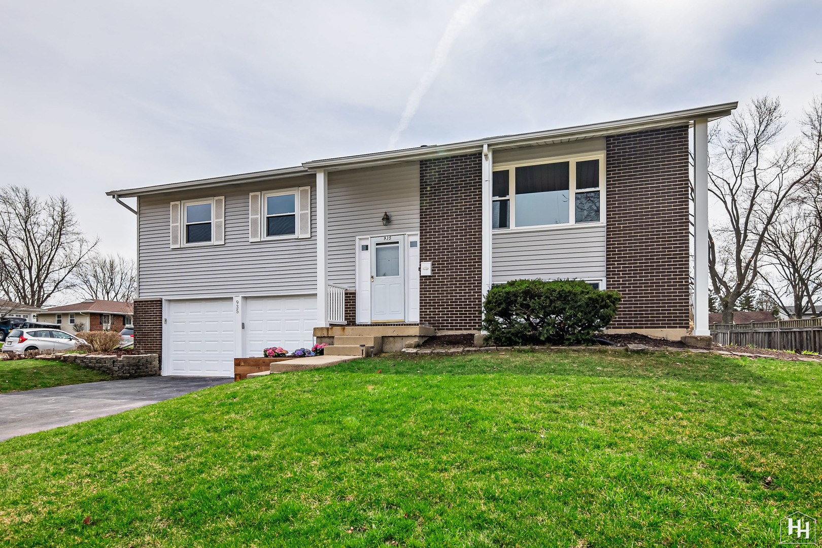 a house view with a garden space