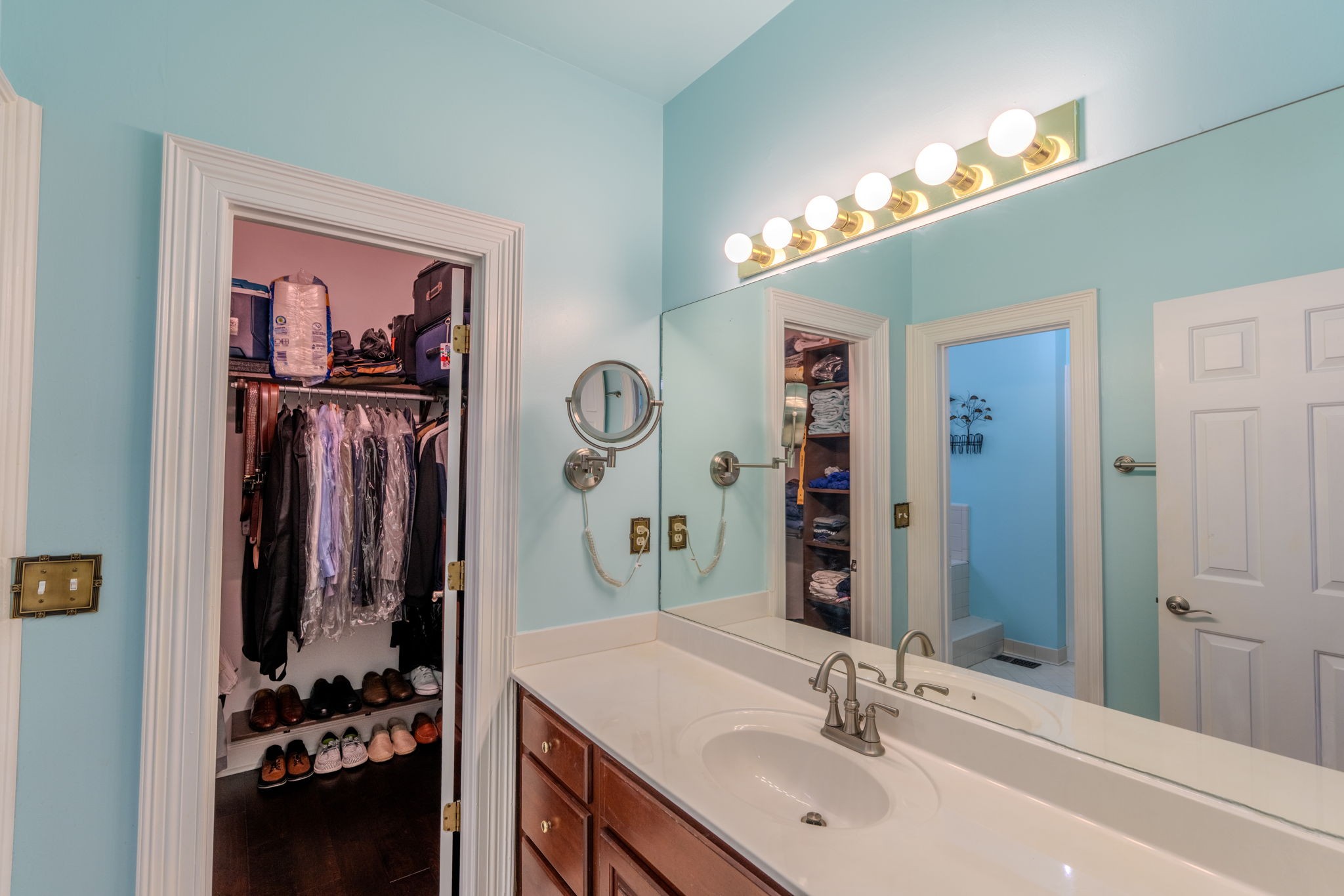 404 Chesterfield Place Franklin, TN 37064 - Photo 22 of 38 a bathroom with a sink a mirror and a shower