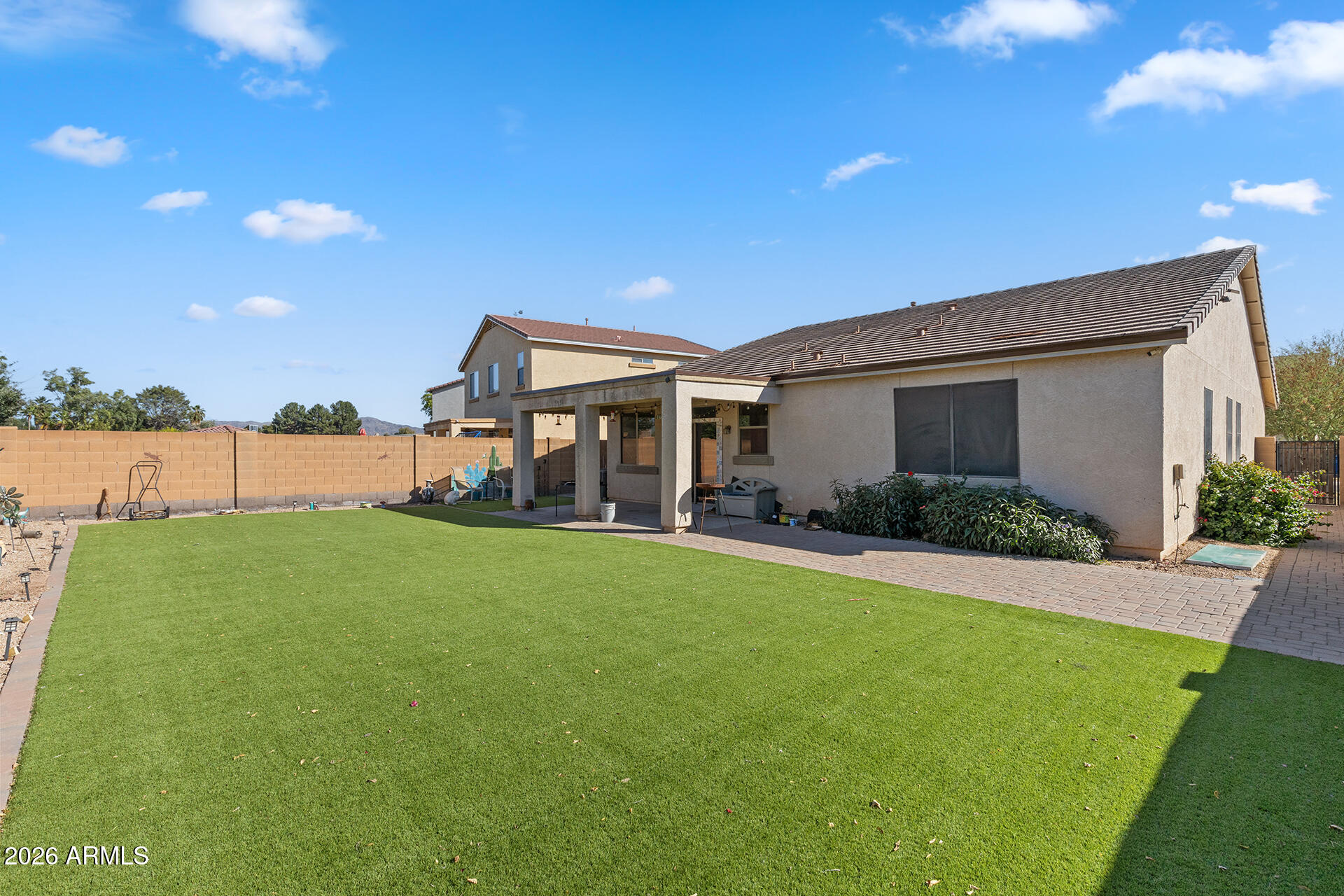 6718 West Darrel Road Laveen, AZ 85339 - Photo 46 of 49 a view of a house with backyard and porch