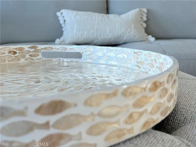 a room with furniture and painting on the wall