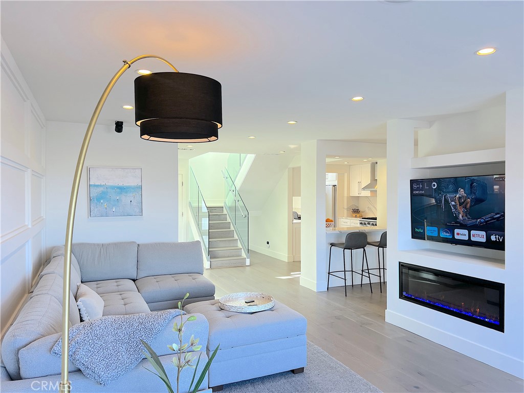 24105 Gourami Bay Dana Point, CA 92629 - Photo 15 of 56 a living room with furniture and a flat screen tv