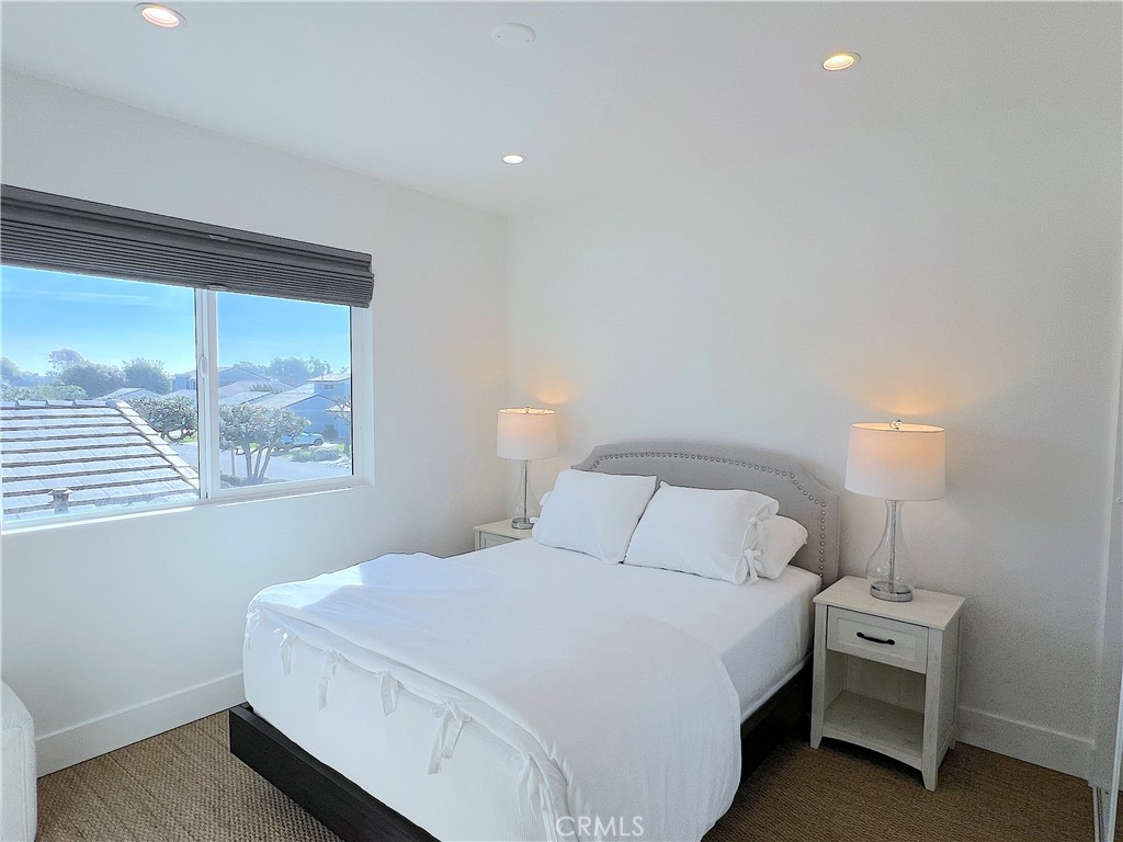 24105 Gourami Bay Dana Point, CA 92629 - Photo 44 of 56 a bedroom with a bed and a window