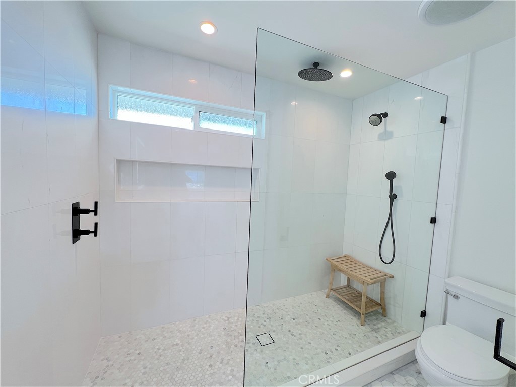 24105 Gourami Bay Dana Point, CA 92629 - Photo 54 of 56 a bathroom with a toilet and a shower