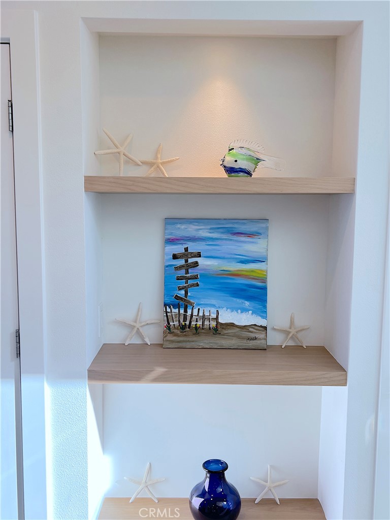 24105 Gourami Bay Dana Point, CA 92629 - Photo 6 of 56 a room with a table and a potted plant