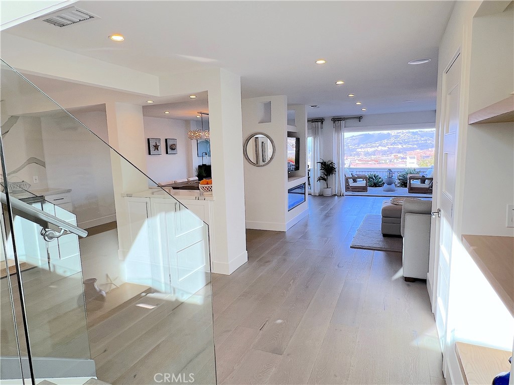 24105 Gourami Bay Dana Point, CA 92629 - Photo 9 of 56 a living room with furniture and a wooden floor