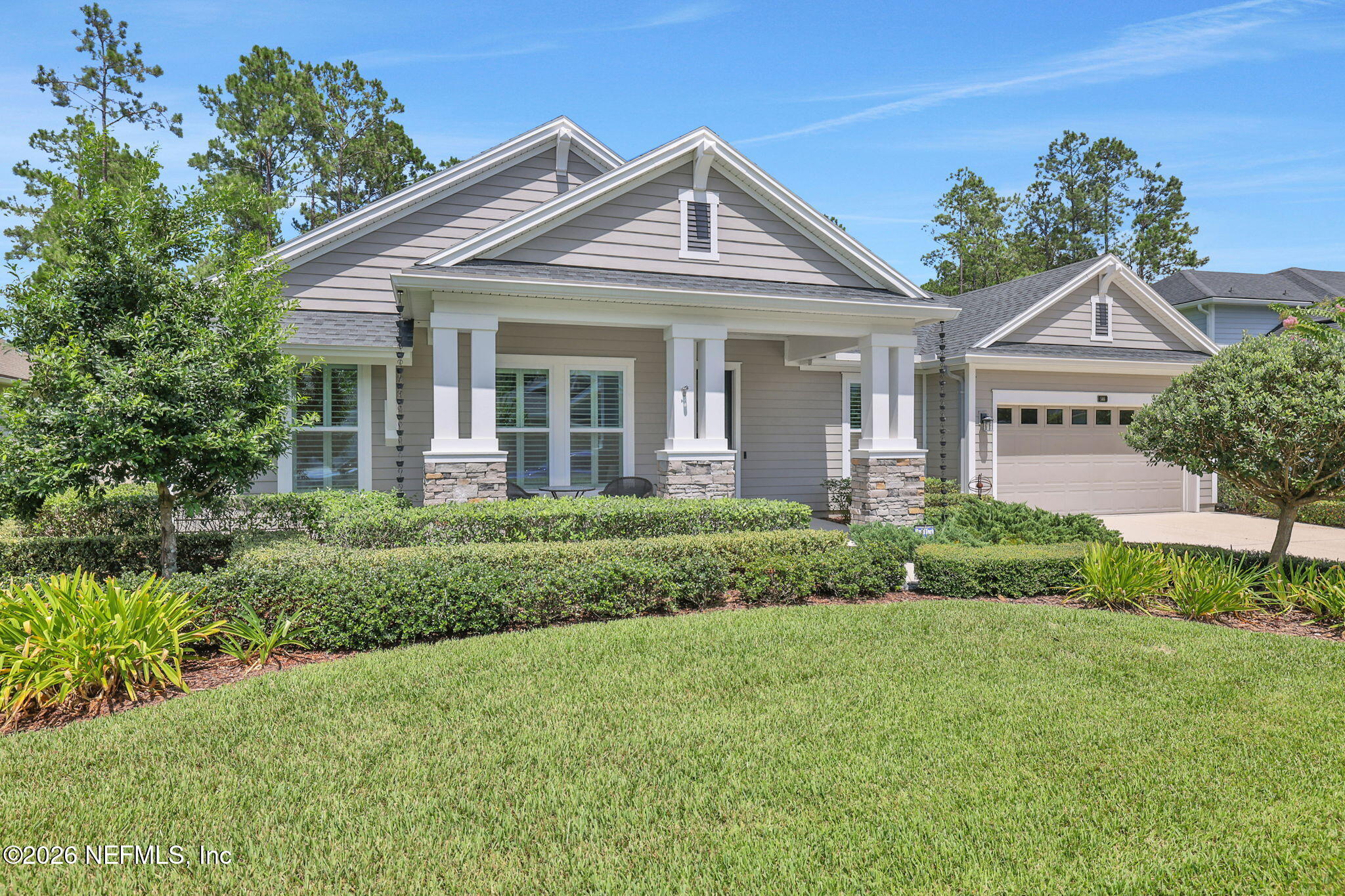 146 Clarendon Road St. Johns, FL 32259 - Photo 3 of 59 a front view of a house with a yard