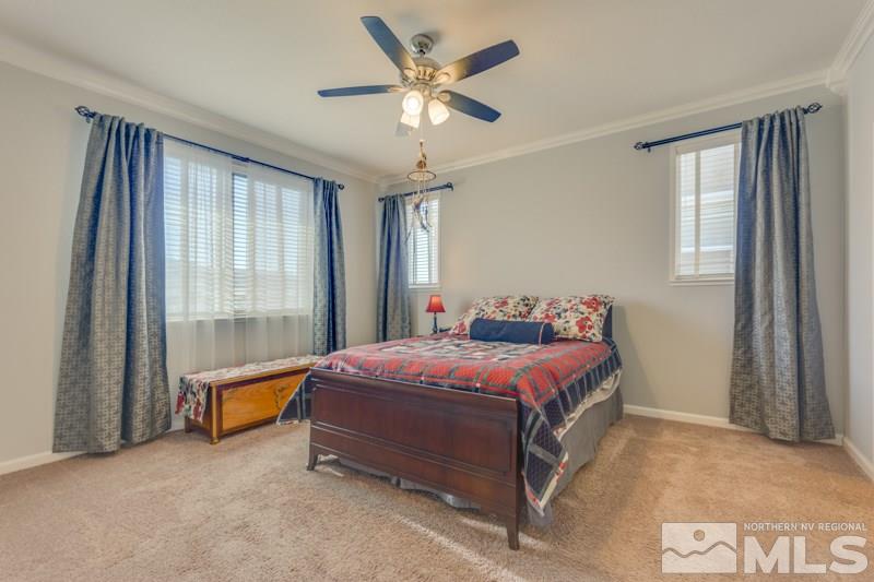 2230 Hope Valley Drive Reno, NV 89521 - Photo 9 of 21 a bed room with a bed and a window