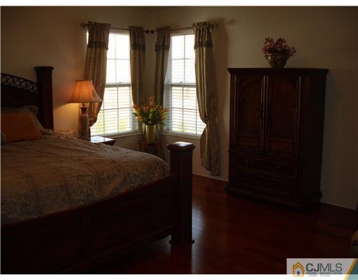 30 Carnation Road Monroe Township, NJ 08831 - Photo 8 of 20 a bedroom with a bed and a window