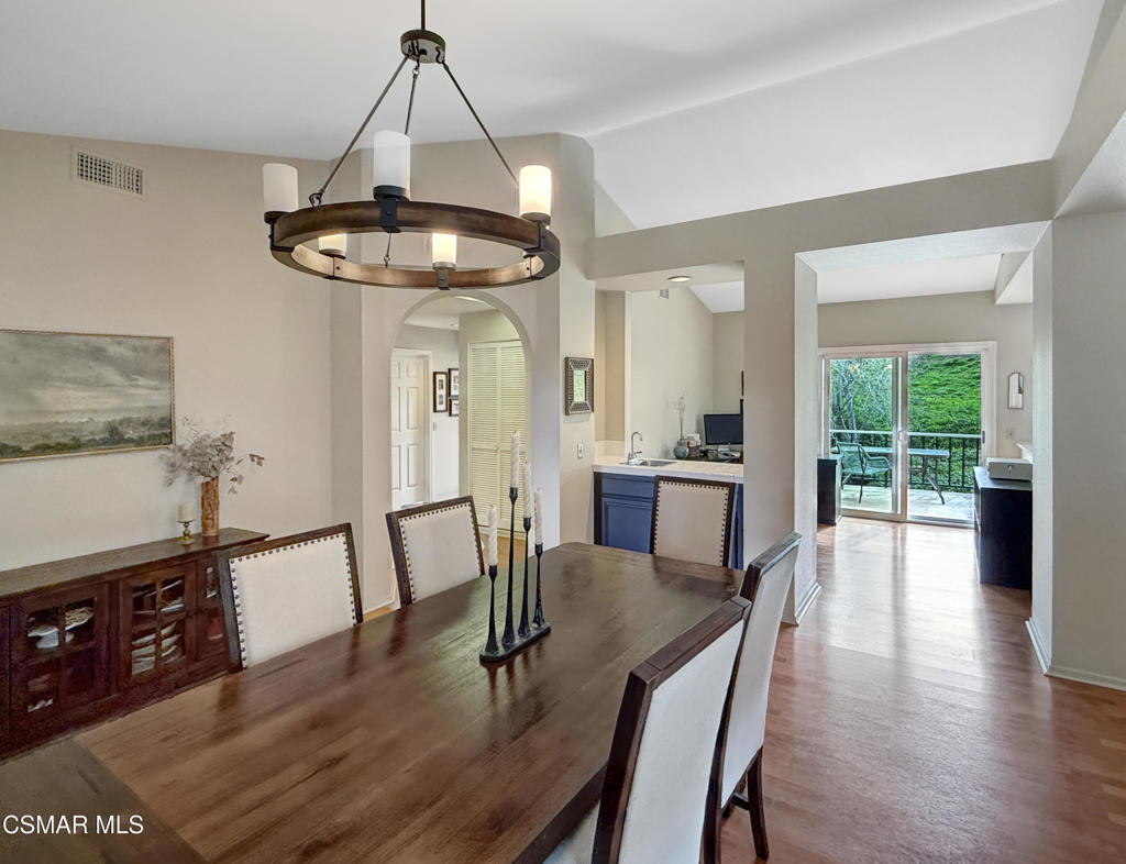 264 Ridgeton Lane, Unit B Simi Valley, CA 93065 - Photo 18 of 32 a view of a dining room with furniture window and wooden floor
