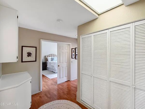 a living room with furniture and a gate